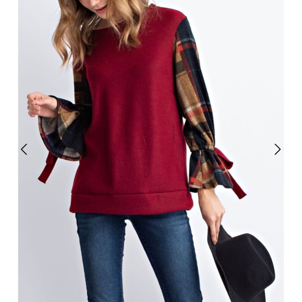 Pullover top with bow sleeve detail!!